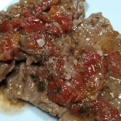 Carne alla pizzaiola alla siciliana: Una ricetta tradizionale