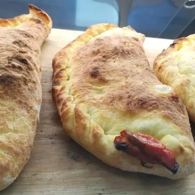 Cuḍḍuruni di Lentini con cipolle